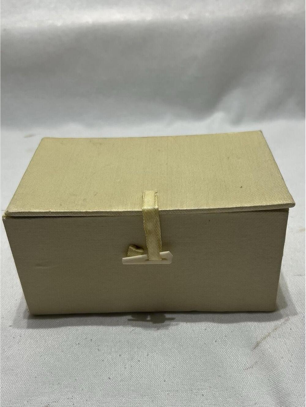 decorative gold satin-covered jewelry or trinket storage box